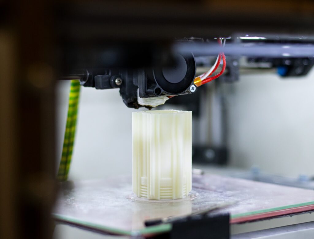 The process of printing a plastic detail on a 3D printer